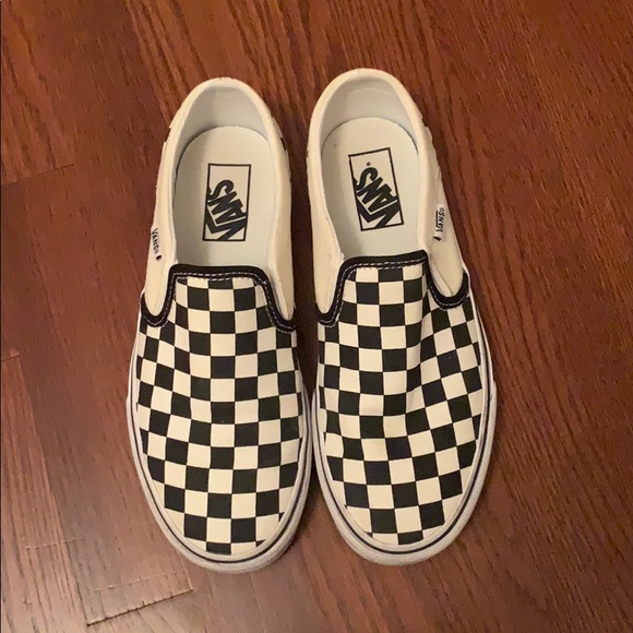 black and off white checkered vans